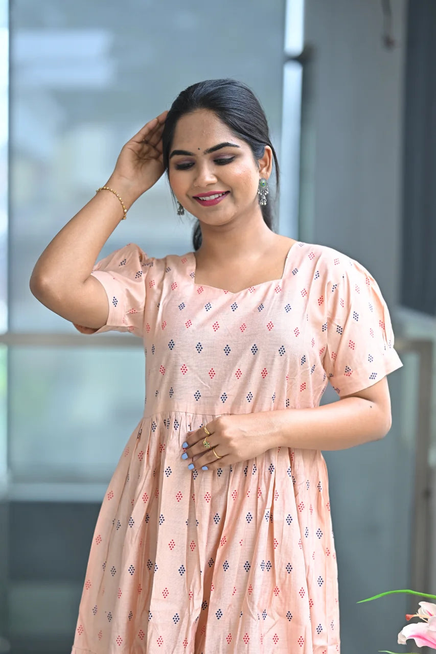 Women’s Light Orange Floral Printed Tiered A-Line Midi Kurti with Boat Neck