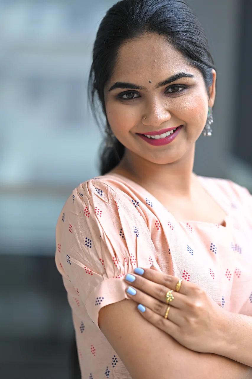 Women’s Light Orange Floral Printed Tiered A-Line Midi Kurti with Boat Neck