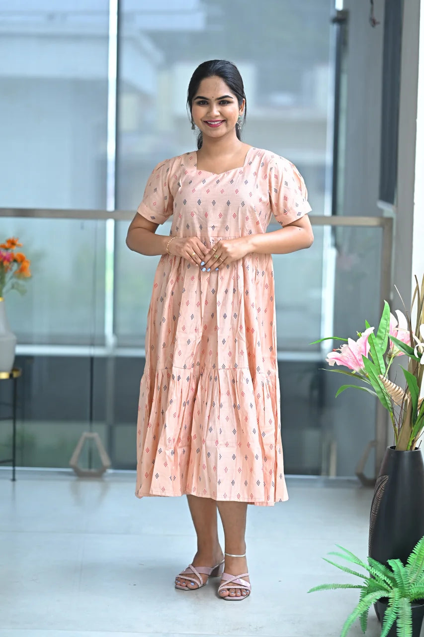 Women’s Light Orange Floral Printed Tiered A-Line Midi Kurti with Boat Neck