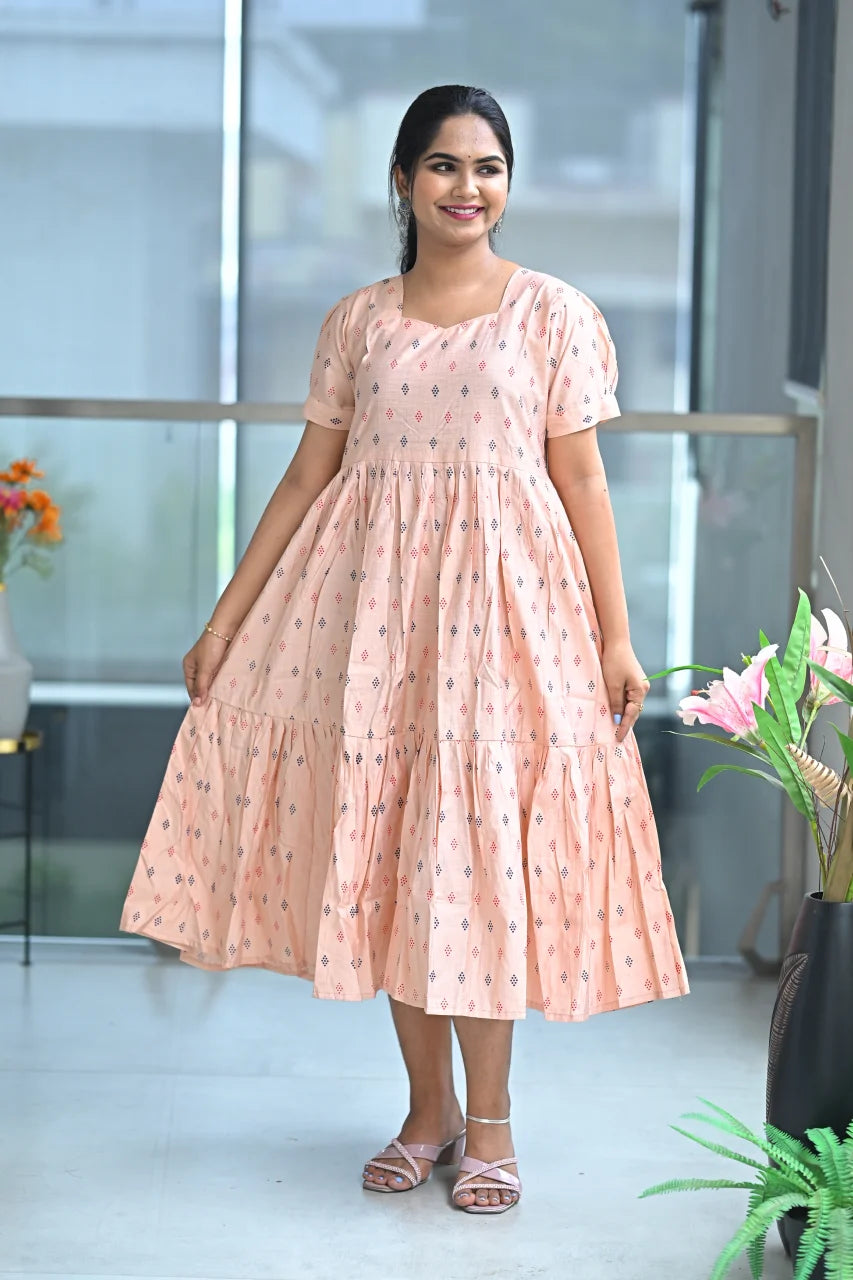 Women’s Light Orange Floral Printed Tiered A-Line Midi Kurti with Boat Neck